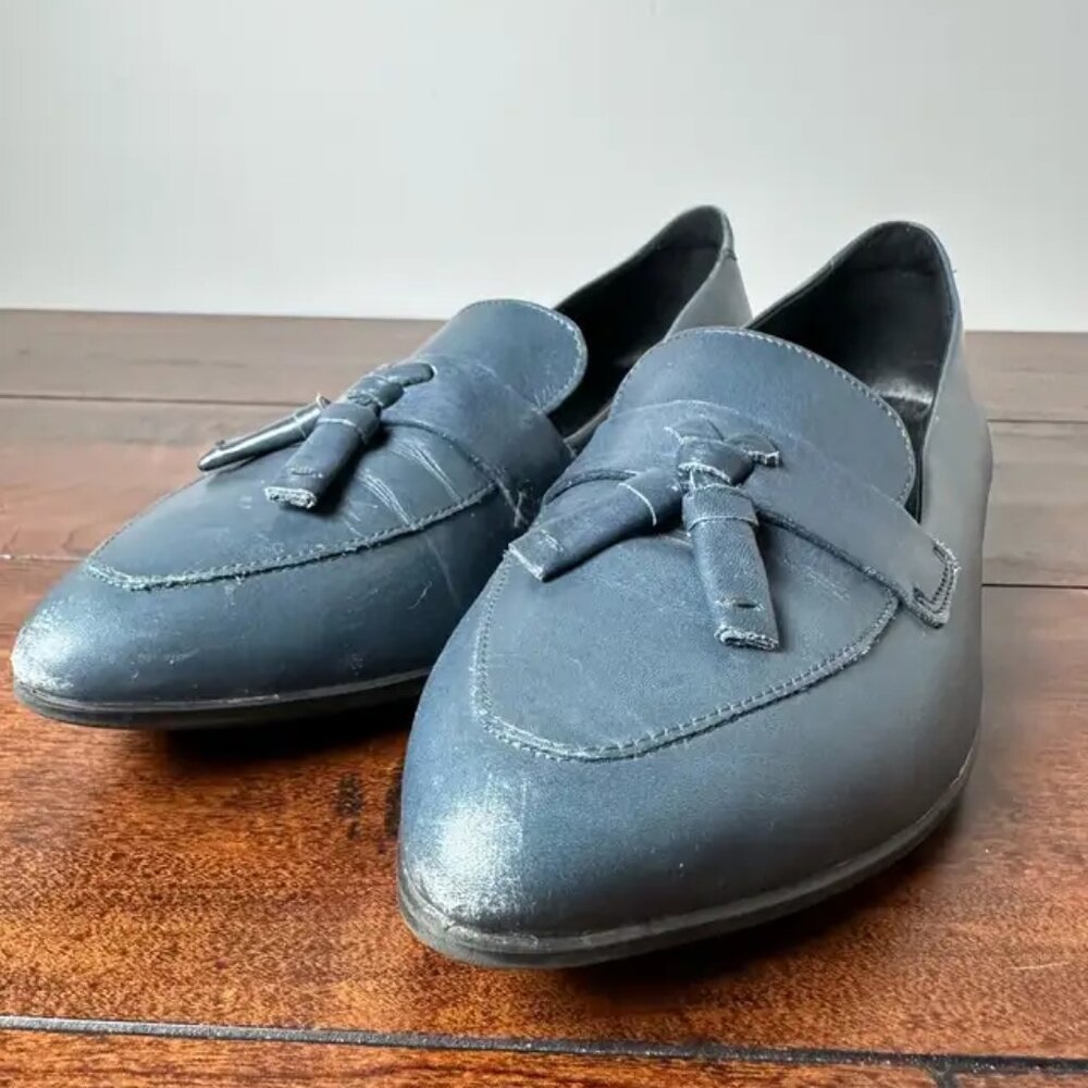 Pair of ECCO Touch 15 Tassel flats in blue leather.